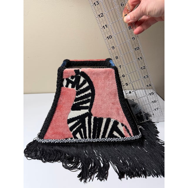 Handmade lampshade crafted from luxurious Regal Farlow velvet featuring a bold zebra motif against a blush pink on 2 sides...