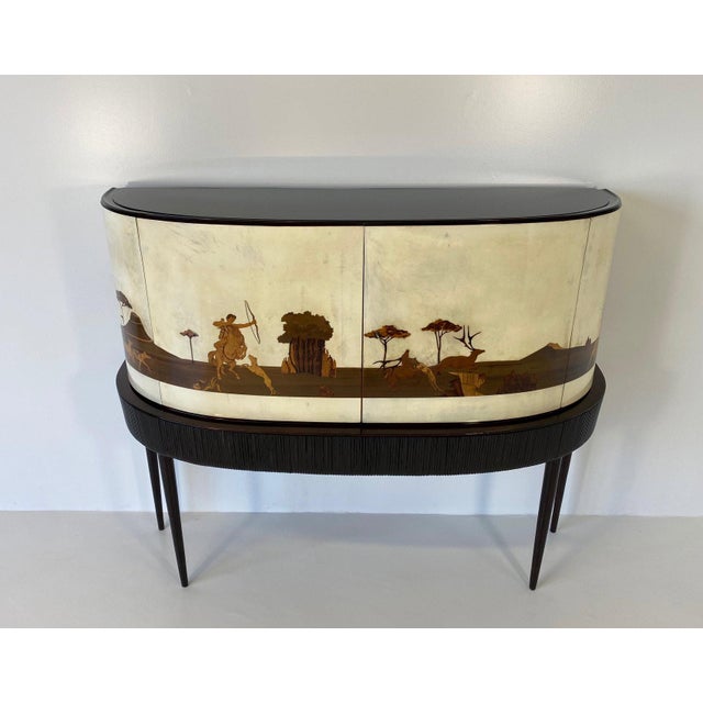 This bar cabinet was produced in Italy, in the late 1930s and is a really unique and special piece. Its tremendous...
