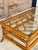 A beautifully crafted vintage bamboo coffee table in the style of Brighton Pavilion, featuring a rectangular glass top,...