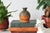 Vintage glazed studio art pottery bud vase. Signed by artist on bottom. No chips or cracks.