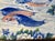 Vintage porcelain platter from Japan featuring a detailed design of koi fish, lotus flowers, and pine branches. This item...