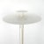 Elegant floor lamp designed and made by Danish lamp specialist Frandsen. It consists of a round base on which three tubes...
