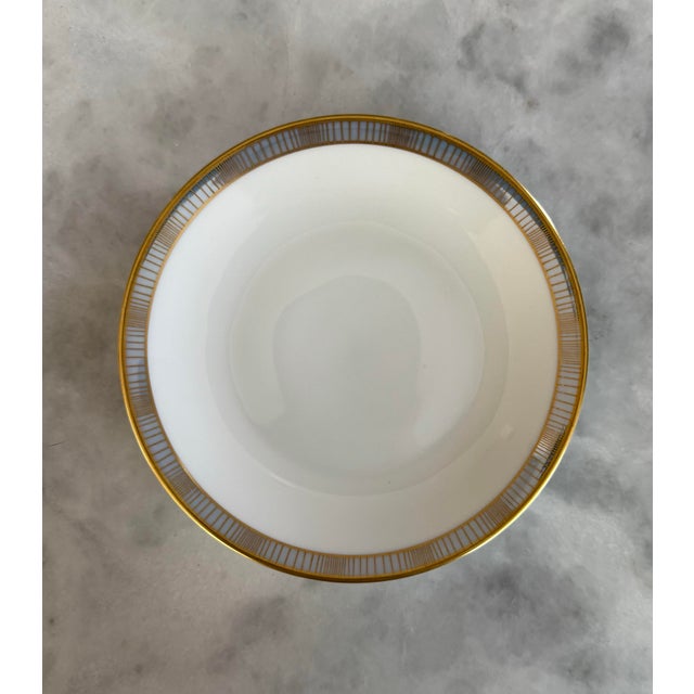 Set of 6 small white porcelain plates in the Continental Blue Band Gold Lines pattern, made by Rosenthal, Germany. Pattern...