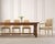 An elegant suite of eight French dining chairs crafted in the grand Louis XVI style, consisting of six side chairs and two...