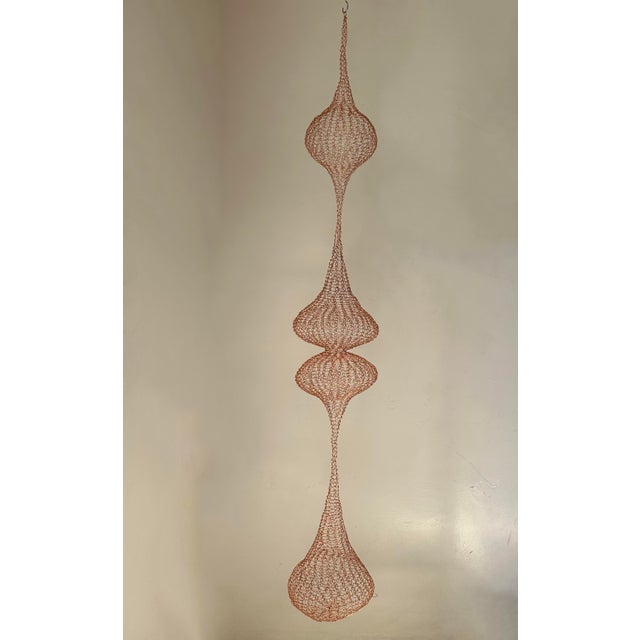 Handmade copper wire sculpture inspired by the hand woven technique of Ruth Asawa.
