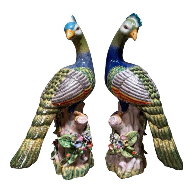 Lovely vintage pair of hand-painted porcelain peacock bird figurines, circa mid-20th century. Beautifully detailed in...