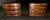An exceptional, showroom-ready pair of vintage Georgian Revival style bow-front bachelor chests/nightstands from...