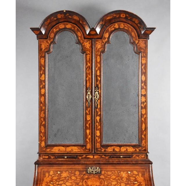 Dutch Marquetry Bureau Bookcase A highly decorative Dutch marquetry bureau bookcase, extensively inlaid throughout with...