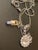 This elegant Givenchy necklace showcases a striking pear-cut crystal pendant framed by a luminous halo of pavé-set round...