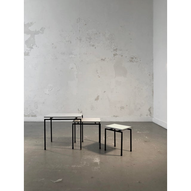 A beautiful set of 3 small nesting tables, or side tables, bedside tables or sofa ends, very graphic and rigorous,...