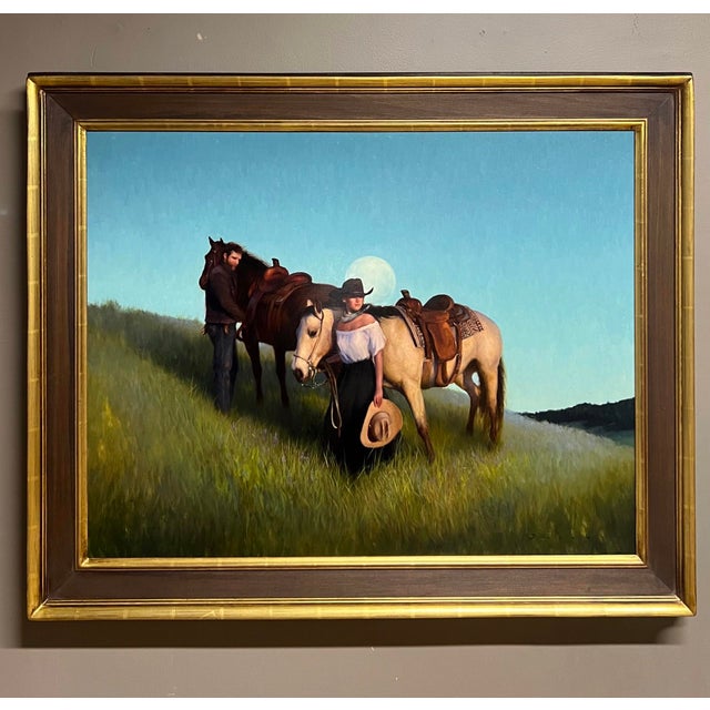 Rising captures a serene moment at dawn, where a woman and a man stand beside their horses against a backdrop of a glowing...