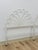 This pair of vintage wrought iron twin headboards brings a charming French country sensibility to any bedroom, finished in...