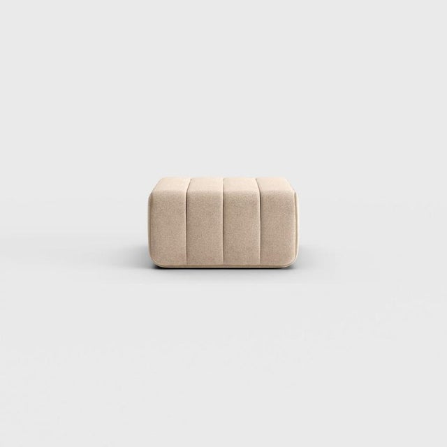 Pouf, stool, ottoman—or simply the building block for what is probably the world’s most versatile sofa system? The Curt...