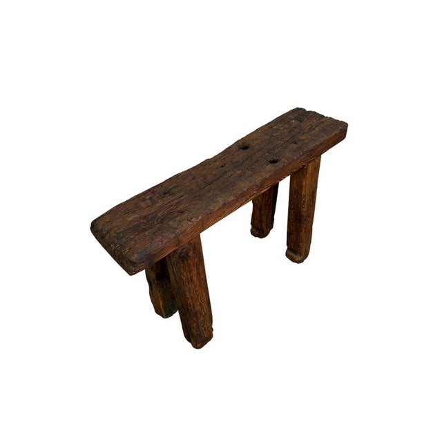 A rustic work table in larch wood dating back to the late 19th century, a piece with a strong lived-in feel, marked by...