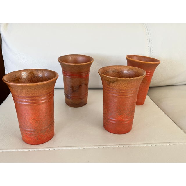 Possibly Pacific Pottery ceramic tumblers made in Southern California. These were bought in Southern California and are in...