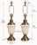 A grand matching pair of vintage urn-form table lamps, newly composed in a warm neoclassical palette of creamy ivory and...