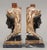 Pair of French Empire neoclassical female heads, mounted on black marble bases. Originally used as carved elements on a...