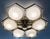 Italian midcentury flush mount with six glossy gray Murano glass shades mounted on solid brass frame in satin brass finish...