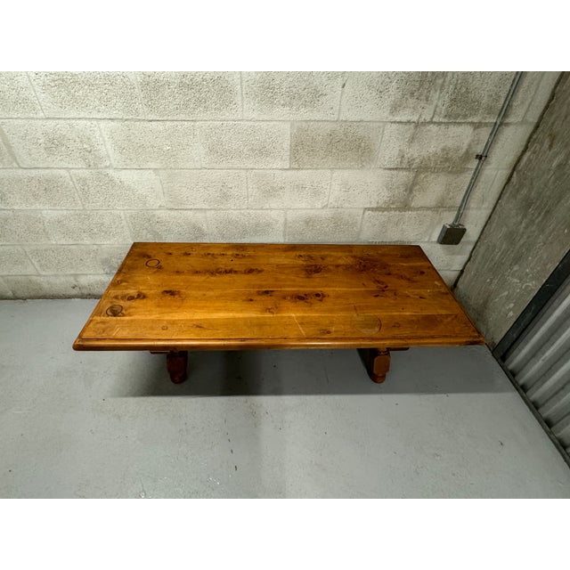 Bring timeless character to your living space with this Vintage 1960s Rustic Coffee Table. Expertly crafted from solid...