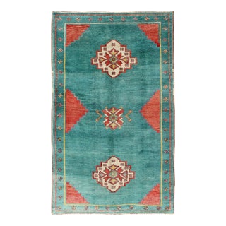 Teal-Colored Oushak Hand Knotted Vintage Turkish Rug With Three Medallions, Red Cornices For Sale