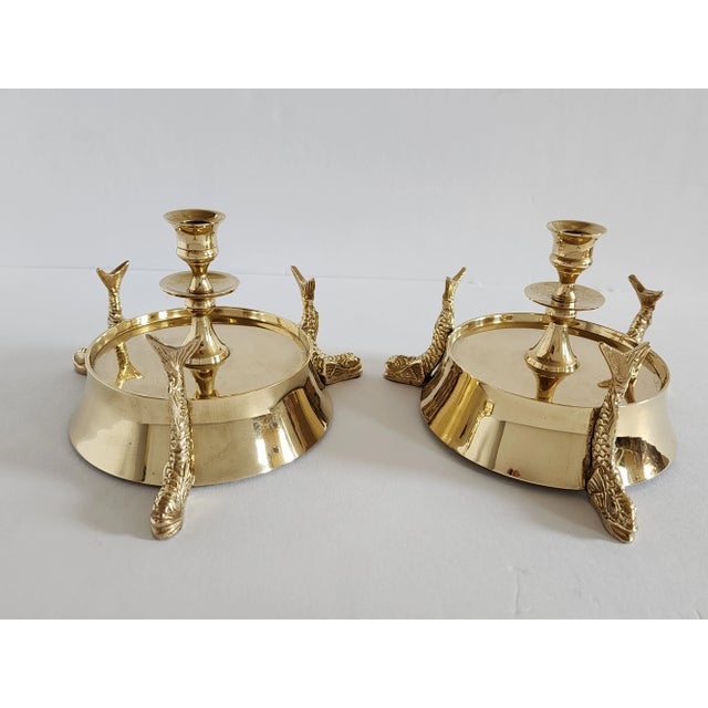 Pair of vintage Wildwood polished brass large candle holders with koi fish motif. Perfect for a dining table setting or as...