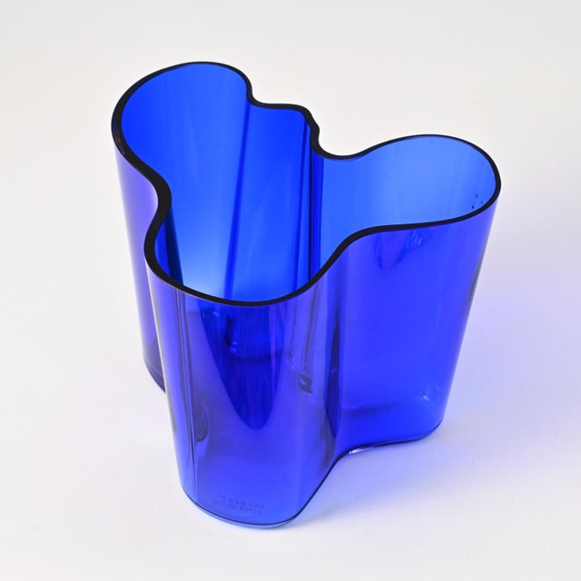 Cobalt blue glass Savoy (3030) vase designed by Alvar Aalto for Iittala in 1937. Signed and hand-numbered 2574/1992. This...