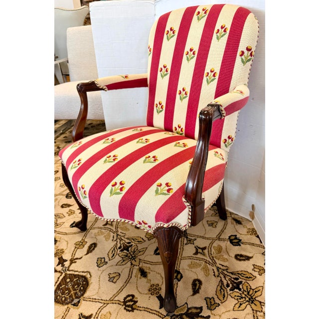 Classic French bergère armchair with a beautifully shaped carved wood frame and graceful cabriole legs. Custom upholstery...