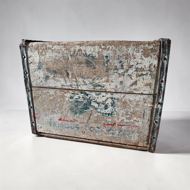 Clover Leaf Creamery was a major regional milk distributor during the mid-1900s. These rugged wood-and-galvanized-steel...