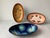 These bowls are vintage enamel bowls, attributed to the Mid-Century Modern style and typically dating from the 1950s to...