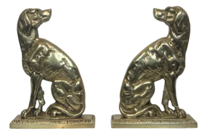 Pair of bronze andirons depicting dogs French works from the Art Deco period