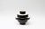 This ceramic Mont&eacute;e vase is in a glossy black and white. Stamped by Maker,Stamped by Maker