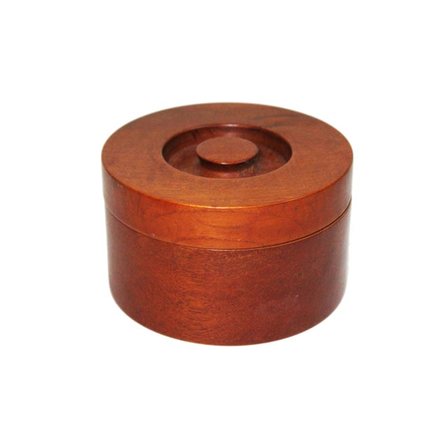 Denmark, 1960s Solid turned lidded container. Beautifully rich old growth teak. Hand turned solid teak or mahogany. A...