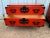 Mid 20th Century Vintage Asian Style Red Painted Iron Mounded Campaign Cedar Type Chests. A Pair For Sale - Image 9 of 12
