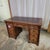 This Antique English Oak Leather Top Pedestal Desk With Acanthus Leaf Carvings is on bracket feet. It has 9 drawers for...