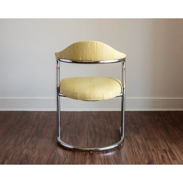 This is a wonderful, whimsical vintage chrome chair - perfect for a small apartment, desk or entryway. Professionally...