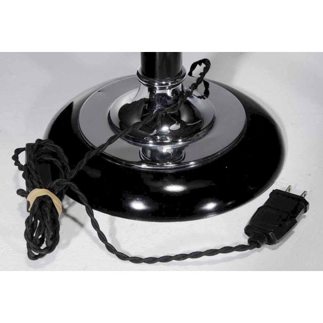 French, 20th century, white opaline shade with open top, black lacquered and chrome base, pull chain, drilled and...