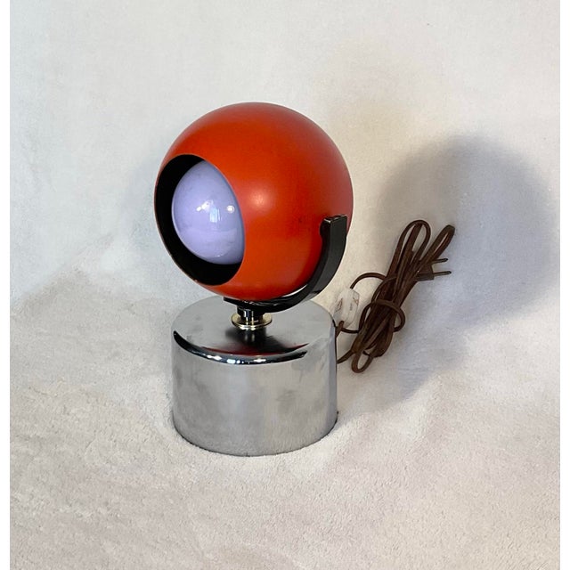 Vintage Mid Century Modern space age desk/table lamp from the late 1960’s early 1970’s. This lamp features orange metal...