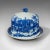This is an antique cheese keeper. An English, ceramic butter dome with historical print, dating to the Victorian period,...