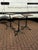 3 1920s Industrial Metal Machinist Tables with Wooden Tops. There is a close matched pair and a single close in design,...