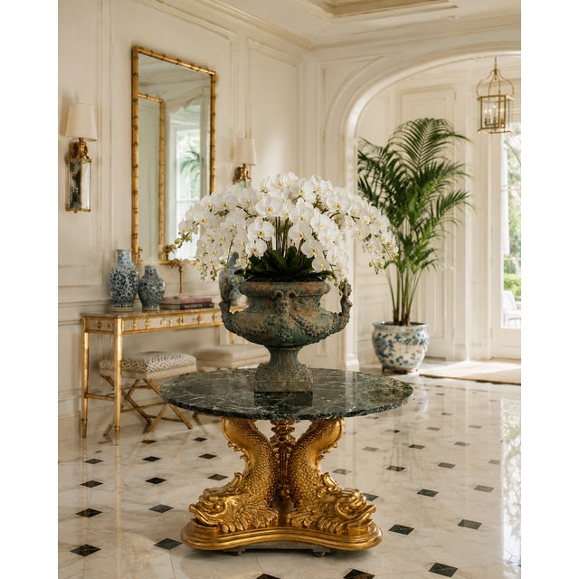 A remarkable Italian entryway table, dating from approximately 1910 to 1930, showcases the level of craftsmanship and...