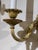 A pair of 1920's Caldwell Empire style bronze double light sconces.