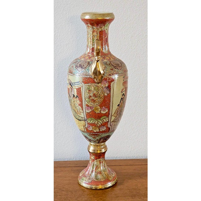 Bring refined, old-world elegance into your home with this striking Japanese Satsuma-style porcelain urn. Standing 16.5...