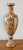 Bring refined, old-world elegance into your home with this striking Japanese Satsuma-style porcelain urn. Standing 16.5...