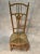 Provencal beech nurse chair, seating in colorful straw.