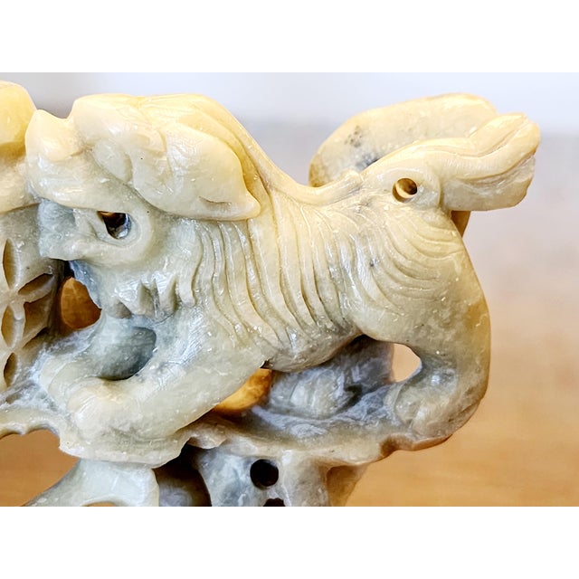 Three Fu Dog Dragon Incense Burner Dimensions: 6 1/8h x 6 1/2w x 1 7/8"d Made of lighter jade soapstone figures and brown...