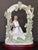 Figurative Lladró Tranquility (Model #06677) Porcelain Figurine, Featuring a Seated Woman Under a Floral Arbor For Sale - Image 3 of 6