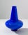 This striking 1960s Italian blue glass vase is a true emblem of mid-century modern design, boasting a vibrant cobalt blue...