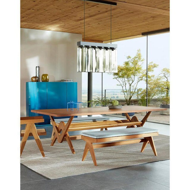 Dining set designed by pierre jeanneret circa 1950, relaunched in 2019. manufactured by cassina in italy. set consisting...