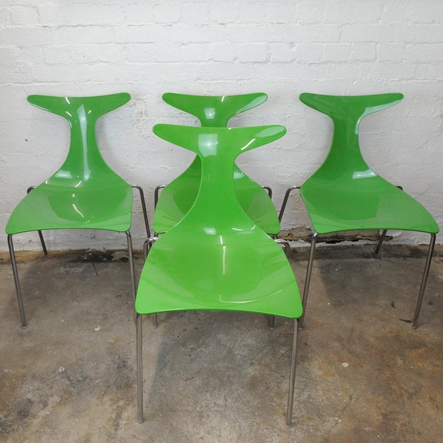A set of four dining chairs, designed by Gino Carollo for Ciacci Kreaty. Italian Green Stacking Delfy Chairs, 1980s, Set...