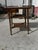 Vintage Aesthetic Movement square turned leg table. It has 3 tiers, the upper one being of nicely crafted fretwork. The...